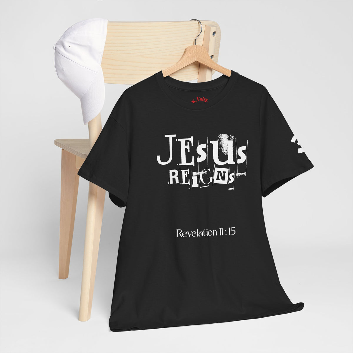 Jesus Reigns Revelation 11:15 Logo Tee | Retro collegiate script, small chest print